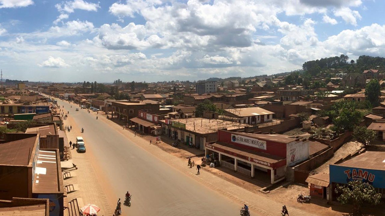 Stand-in, not a photo of this event: 2016 panoramic view of Butembo in North Kivu, Democratic Republic of the Congo, with hills, buildings and trees under a hazy sky