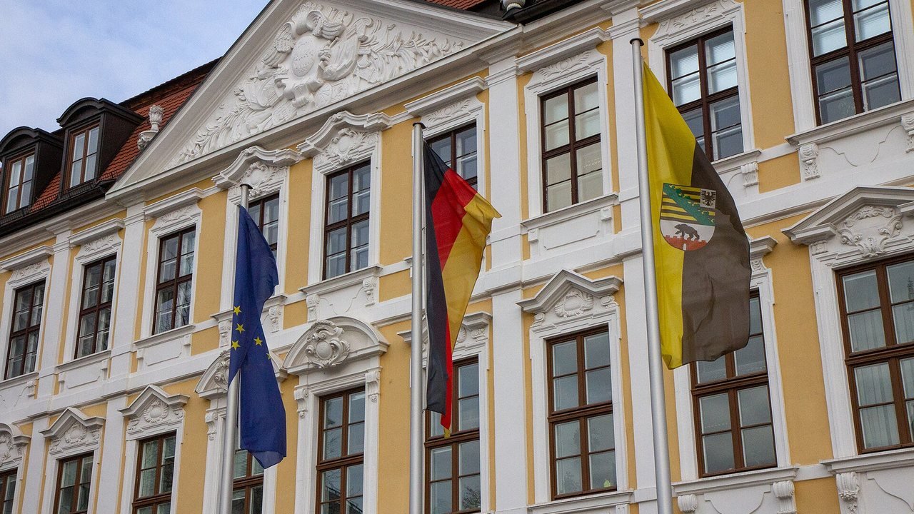 Stand-in: November 2018 file photo of the Saxony-Anhalt state parliament building in Magdeburg with European, German, and state flags, not a photo of Tuesday’s vote