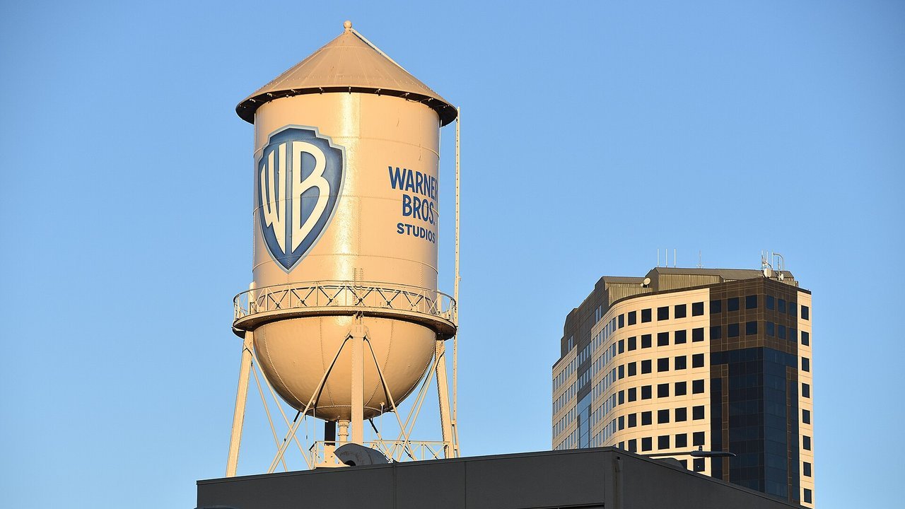 Stand-in: November 2020 file photo of the Warner Bros. Studios water tower in Burbank, California, not a photo of Tuesday’s deal closing